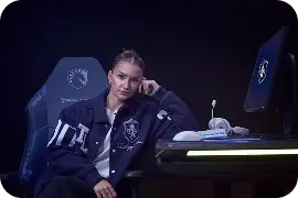 Users sitting on the Athena Pro liquid edition gaming chair