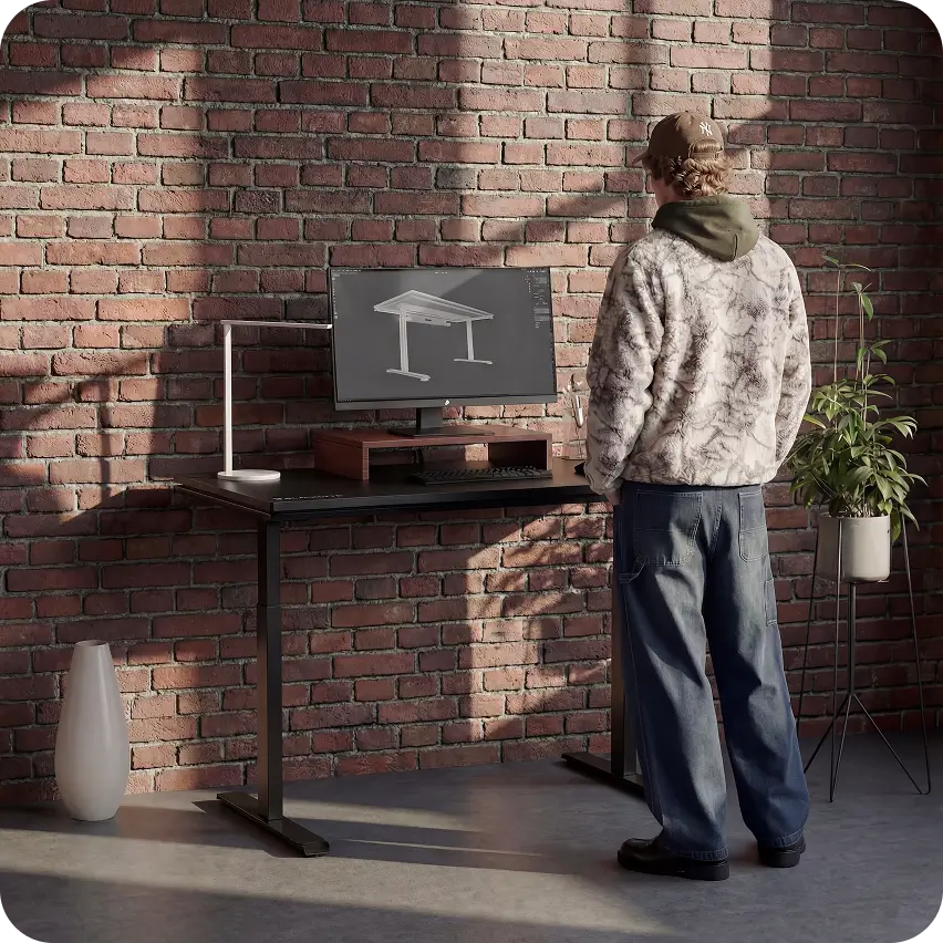 Atlas Lite electric standing desk with silent and stable height adjustment