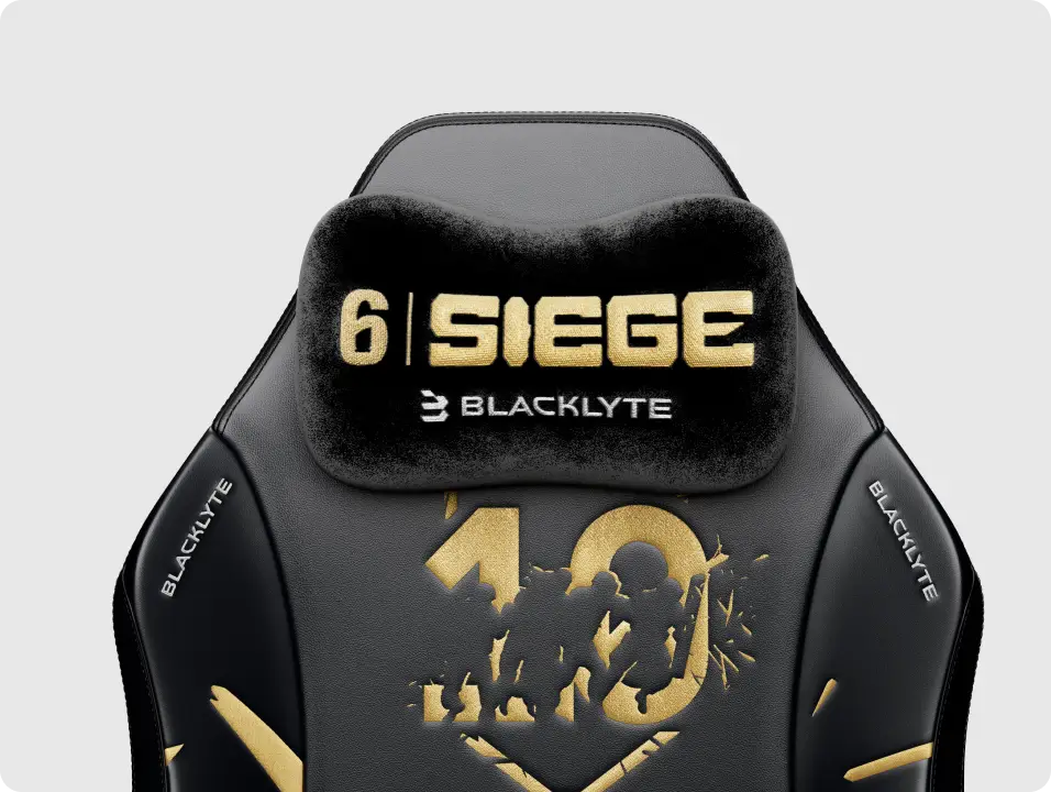 R6 10th Anniversary Edition gaming chair with a magnetic headrest pillow